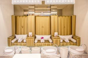 Elegant and contemporary spa interior featuring luxurious pedicure stations for relaxation.