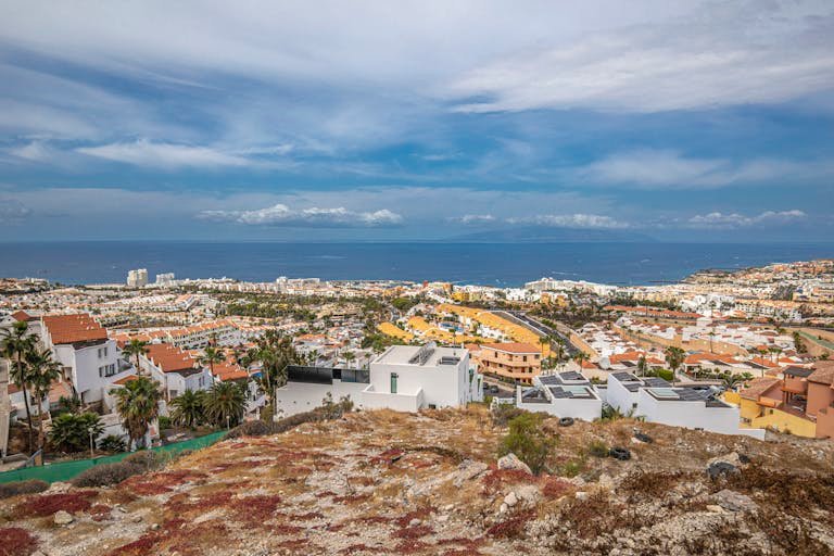 Scenic aerial view of Costa Adeje coastline and urban area, Tenerife, Spain.
